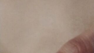 Squeezing my juicy nipple