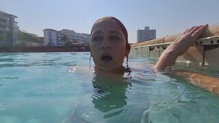 Swimming in a huge swimming pool, and blowing bubbles while I swim