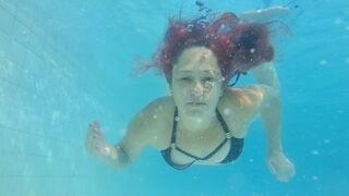 Full body view of me swimming and blowing bubbles