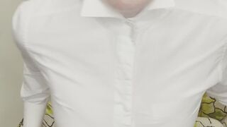 Woman removing pantyhose, shirt, and tie