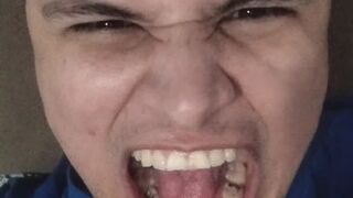 Silly dude doing stupid scary faces and showing my teeth