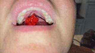Kimmy Swallowing Gummy Bears