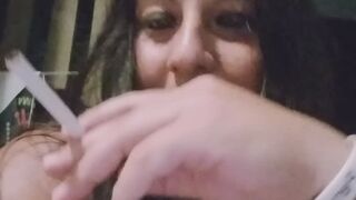 Smoking and drinking in a dark goth mode