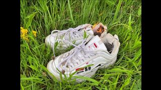Fuck nature, burning old Fila sneakers from girl