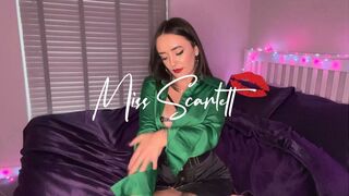 Scarlett's black pencil skirt and emerald satin blouse tease