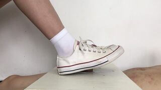 Cock under sneakers