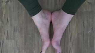 Size 18 feet Yoga pose measuring comparing