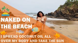 Nudist and exhibitionist girl puts on suntan oil and sunbathes naked on the beach