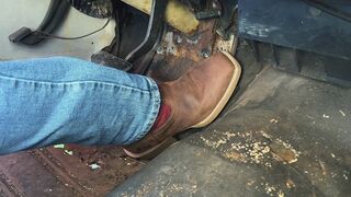 Cowboy boot pumping the gas pedal, cranking it, and revving it up