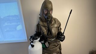 Chemical Testing in a Hazmat Suit, Rubber Gloves, and a Gas Mask
