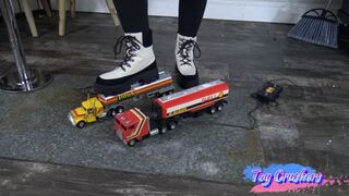 red and yellow tractor trailer crush