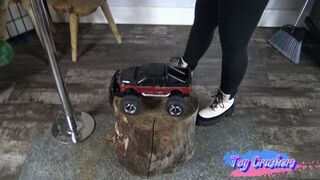 red and black truck crush