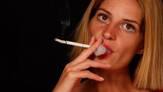 Sexy blond Eve smokes long 120s with passion and speed, building an impressively thick ash
