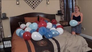Sexy balloon fun on the bed!