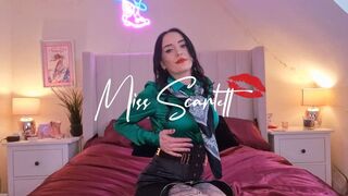 Scarlett's black satin pencil skirt and emerald tease
