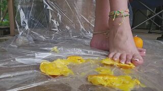 Crushing oranges barefoot
