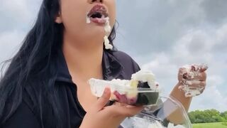 PIG STUFFING HERSELF WITH CAKES IN PUBLIC IN FRONT OF 2 POLICE OFFICERS