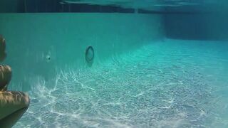 Post breatholding practice underwater swimming in snorkel mask and new swimsuit