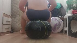 100kg, 220lbs sitting bouncing and popping big soft balls
