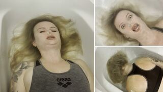 Anastasia struggle to hold her breath underwater