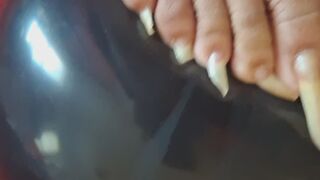 Popping Black Balloons with 2 inch toenails