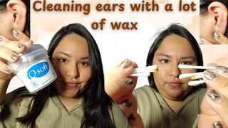 Cleaning my dirty ears with a lot of wax