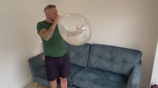 JL blowing up massive confetti balloons - non pop.