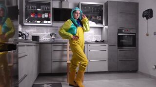 Amira in layers of plastic rainwear and Friensennerz bondage part 1 BTS dressing up