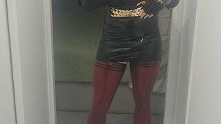 Latex crossdresser masturbating