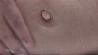 Candy ball in my belly button and lotion rub
