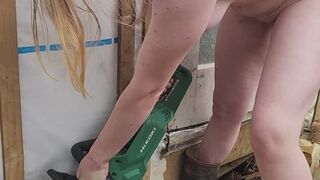 Naked girl using her chainsaw