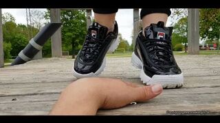 hand trample in cute new Fila sneakers