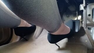 Black suede pointed toe spike pumps driving van