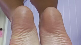 Quick, your GF is in the other room. Let my oiled soles take care of you