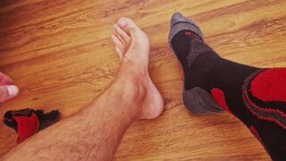 Man's socks, barefoot