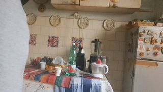 MAKING A CUP OF COFFEE EXPOSING ASS