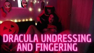 Dracula undressing and fingering