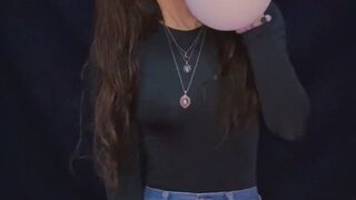 Empress Scarlett blows and pops balloons