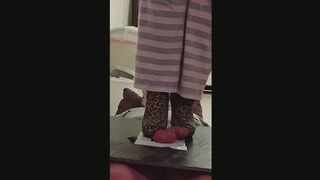 High Heel Trampling Balls Under Cockboard