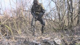 Pissing and wanking in waders and rubber gloves in the forest