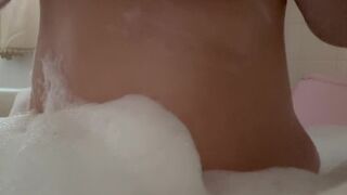 Sexy Milf takes a bath and plays with bubbles