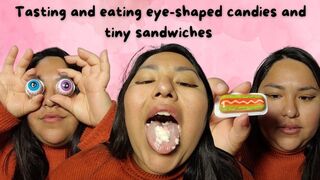 Eating tiny candies with my big mouth