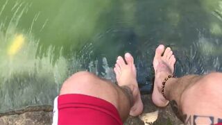 washing sweaty feet in the lake