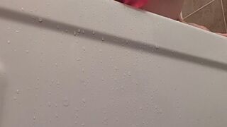 Pawg sucks and rides pink dildo in the shower