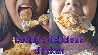 Devouring pieces of fried chicken with his hands