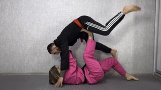 Real cool karate fight with lots of throws and foot domination
