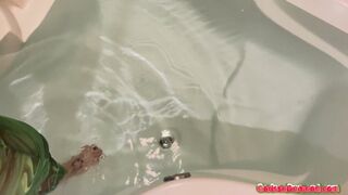 Carissa in the garden tub with gas mask—return to bathtub chronicles!