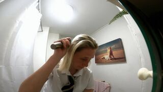 Schoolgirl Danielle Brushing Her Hair In The Mirror