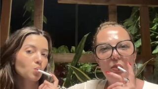 Stepmom and Stepdaughter blowing smoke in your face!