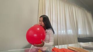 Akina blows balloons at her dining table part 2 copy